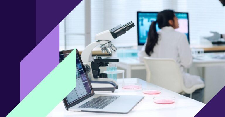 Scientist working with laboratory and data analysis tools to support data governance in regulated drug discovery.